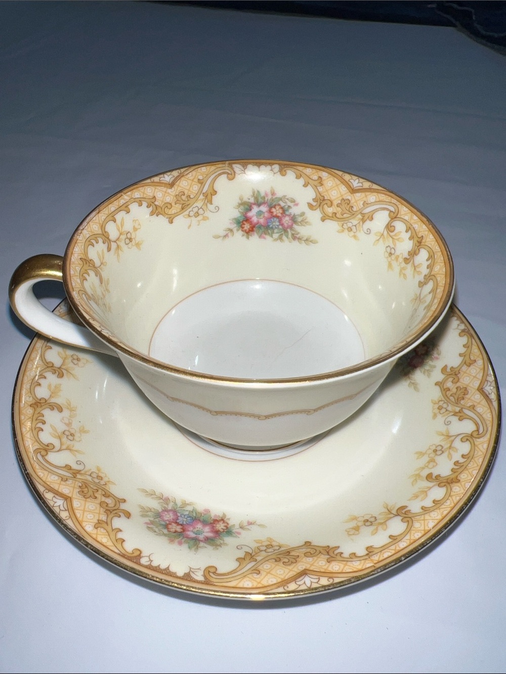 Noritake Cream and Gold Floral Teacup with Saucer